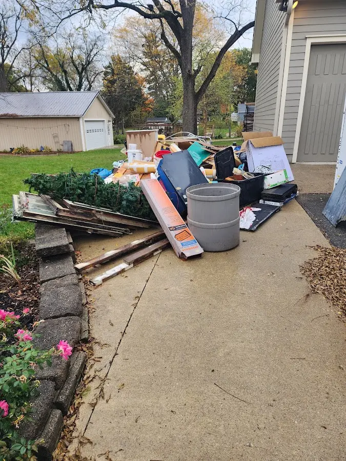 Dumpster being loaded with debris for 30 Yard Dumpster Rental in West Whittier-Los Nietos